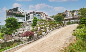 Daebudo Log House with View Pension