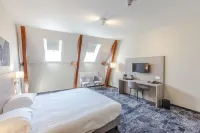 Fletcher Hotel Paleis Stadhouderlijk Hof فنادق في Weidum
