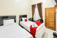 RedDoorz @ Gunari Guest House Merek Karo
