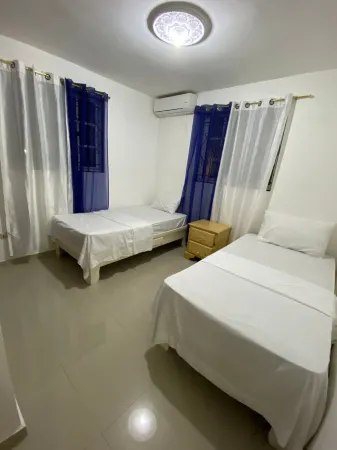 1DR Charming 3-Bedroom Retreat Santo Domingo Отели рядом с достопримечательностью «Iglesia Evangelica Metodista Libre Vista Bella 3ra»