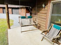 Wooded cabin in the Laurel Highlands with beautiful yard and native trout stream