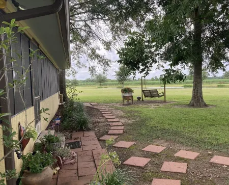 "My Playhouse" Enjoy the country views from the wrap around screened porch