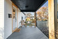 Urban Oasis: A Charming Downtown Retreat with Game Room, Firepit and Yard Games