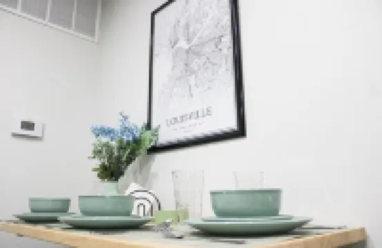 Cozy Riverside Apt. Min to Downtown Louisville.  King Bed, Coffee Bar!