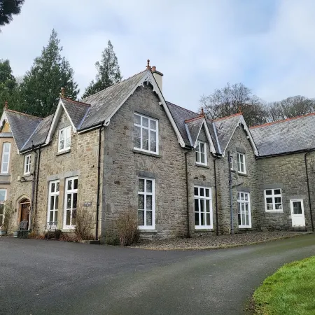 Victorian stone mansion in extensive grounds overlooking Bala Lake