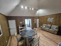 Cozy canal front house with its own boat ramp and dock. Amazing waterfront view.