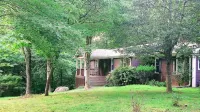 Peaceful, Luxurious Apartment in Wooded Milton Home