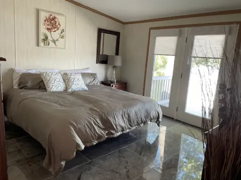 Waterfront Bungalow Nightly Panoramic View of Our Illuminated Covered Bridge