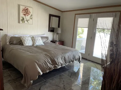 Waterfront Bungalow Nightly Panoramic View of Our Illuminated Covered Bridge Hotels in Galloway