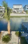 Freshly updated canal front on one of Nat Geo's best beaches Hotels in Sunset Beach