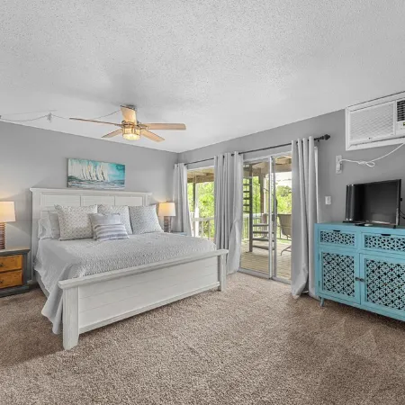 Enjoy lake views from 2 decks! Walk to pool, gym & golf course. Lake access.