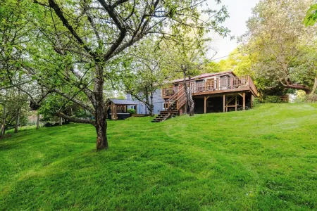 Hot Tub / Home Theater / Private Acre / Walk to Beach / Family and Dog Friendly