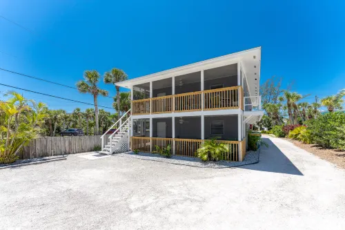 Deeded Beach Access and Private Balcony - Charming Coastal Retreat