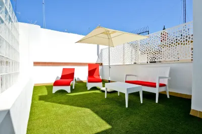 The Zentral Arenal Suites Hotels near Restaurante Oriza