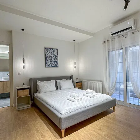 LIV - Modern Comfort Oasis in Pagrati Отели в г. Кесариани