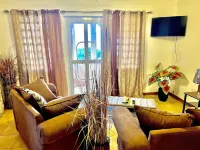 A colored beacon sitting on the hill side road that leads into Sandy Ground, Hotels in Sandy Ground