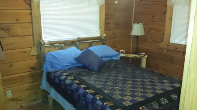 Log cabin 1 next to Three Bears  and Jellystone. UTV rentals from May-October.