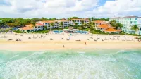 Beachfront 3b ground-level condo with stunning Caribbean Sea views in Playacar 1