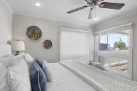 Beach Retreat w/ Sundeck, Golf Cart & Bikes Bungalow House by Avantstay