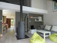 Wooden house in the golf, between forest, lake and ocean