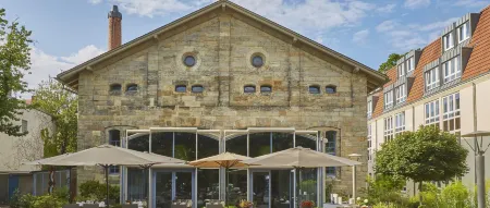 H4 Hotel Residenzschloss Bayreuth Отели рядом с достопримечательностью «Университет Байреута»