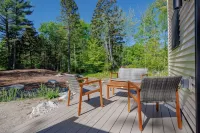 Charming 2-bedroom apartment nestled in a quiet neighborhood with nearby stream.