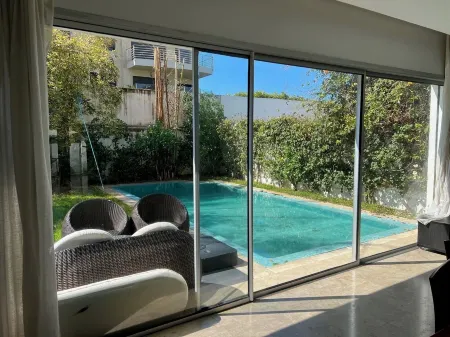 Modern beachfront villa with private pool Отели в г. Ain Chock Hay Hassani