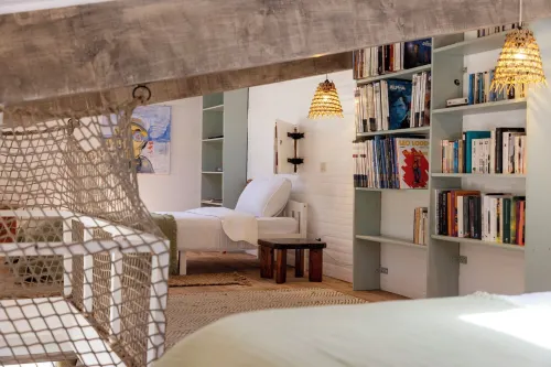 House between sea and scrubland near Arone beach in Piana, Corsica