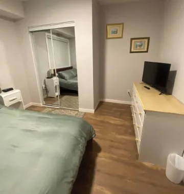 Classy and modern, 2 bedroom suite covered with patio.