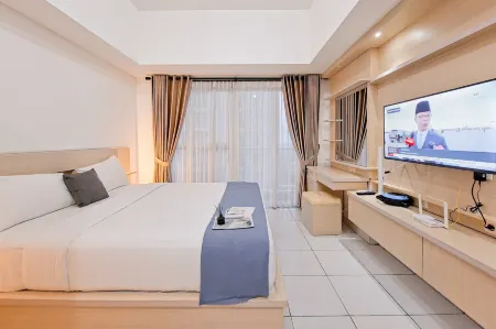 Cozy Studio at Casa De Parco Apartment Отели в г. Cisauk