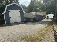 3-bedroom modern mid century cabin! Hot tub, fire pit and lake front