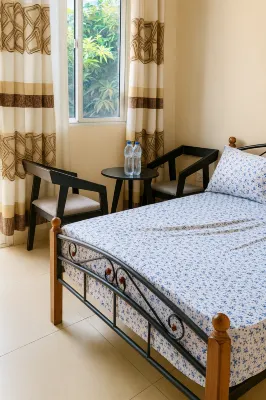 Cozy Guest Room in Kinshasa with Balcony and Partial Air-Conditioning - 2-Star