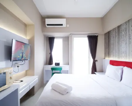 Modern and Homey Studio at Tanglin Supermall Mansion Apartment By Travelio Hotels in Sambikerep