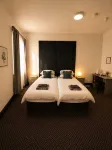 Inviting a Double Room for Business or Leisure - Holiday Apartments