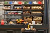 Moxy Kaunas Center - servizio colazione