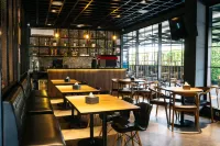 Grand Caman Hotel Отели в г. Pondok Gede