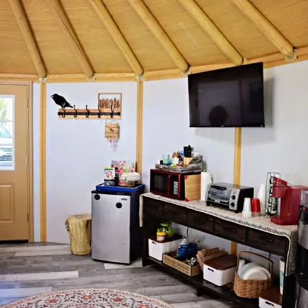 Fanciful mountainside yurt with private bathhouse