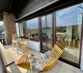 Cozy 5 star apartment with a dream view. Hiking trails and bathing lake nearby.