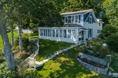 Oceanfront home with private deep water dock on Harmon Harbor, Georgetown, ME