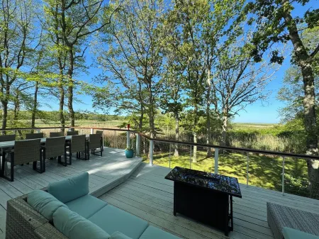 Spacious deck with amazing view, neighborhood path to Skaket Beach, game room