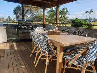 Indoor/outdoor pet-friendly beach house next to world-class beach and river.