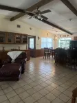 The house is in the middle of town, next to HEB with an amazing backyard.