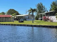 2 houses, 2 boat slips boat ramp,