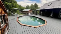 Modern Rustic Log Chalet w/ mtn views, pool & bonus loft on 17 secluded acres