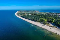 Close to the beach kinderfr. Apartment with balcony+terrace,sauna,wallbox, and washing machine