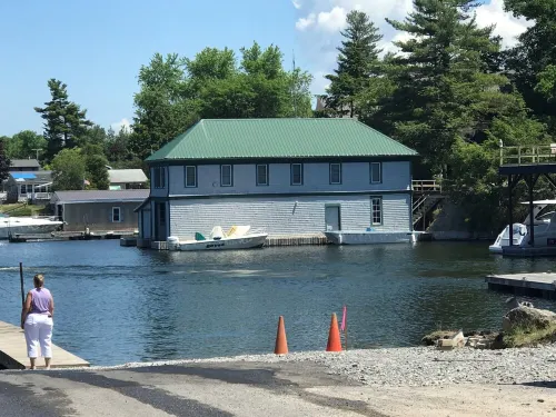 Sunny cottage built over the water on the St. Lawrence River