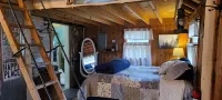 Wood Haven Lodge. Secluded, cozy log cabin in Northern Michigan.