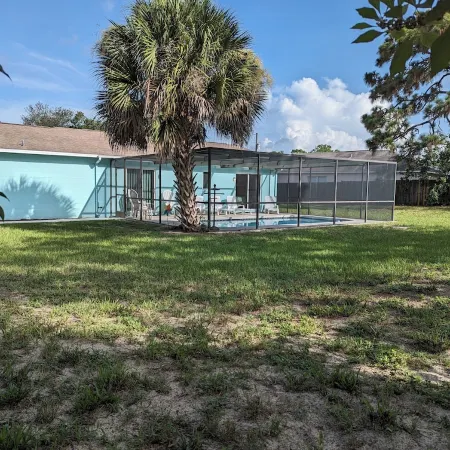• Pool home • Spacious yard •