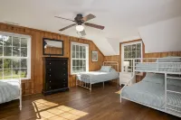 New! Gorgeous Waterfront Estate with Saltwater Pool, Beach and Dock