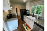 Cute Home with fully fenced yard Hot Tub and Fire Pit.